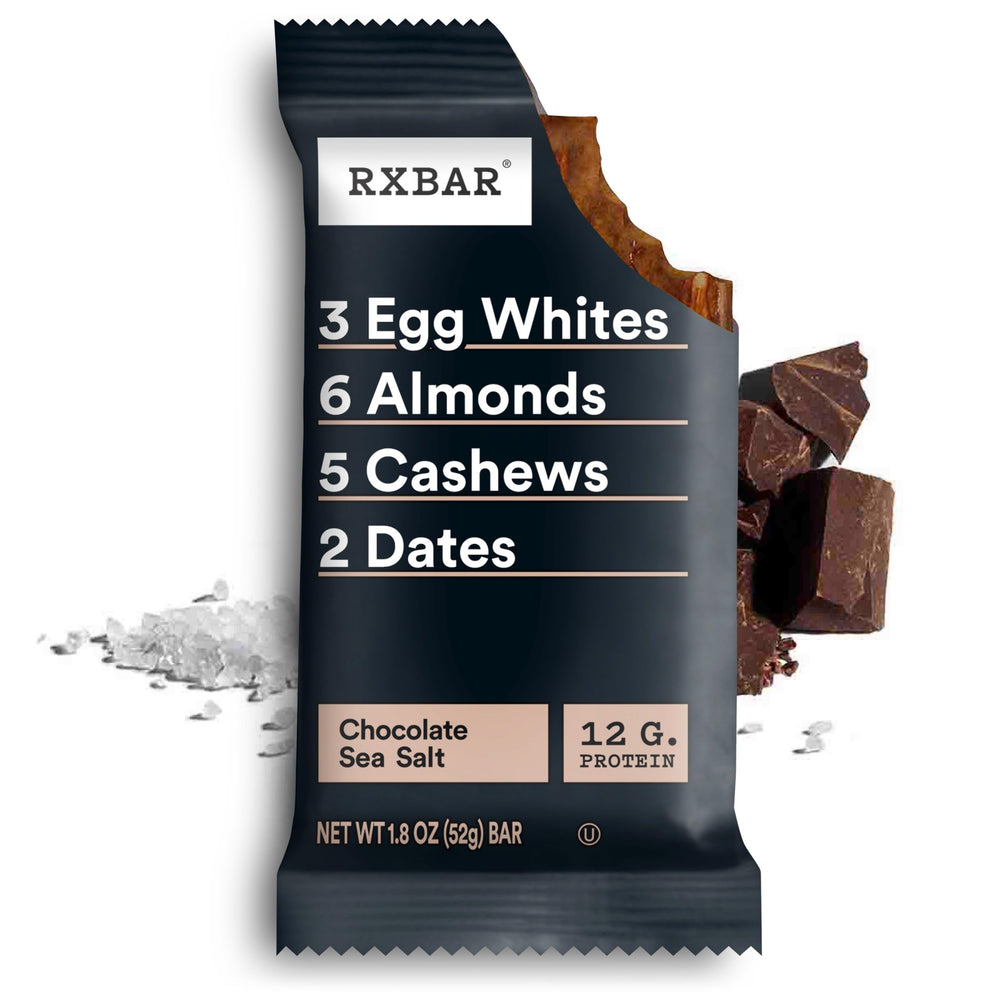 RXBAR Chocolate Sea Salt beside gym gear, ideal pre- or post-workout fuel.