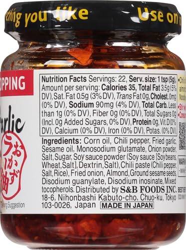 S&B chili oil with crunchy garlic jar open, perfect for adding bold flavor to dishes.