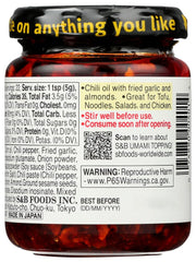 S&B Chili Oil with Crunchy Garlic pours onto a dish for quick flavor enhancement