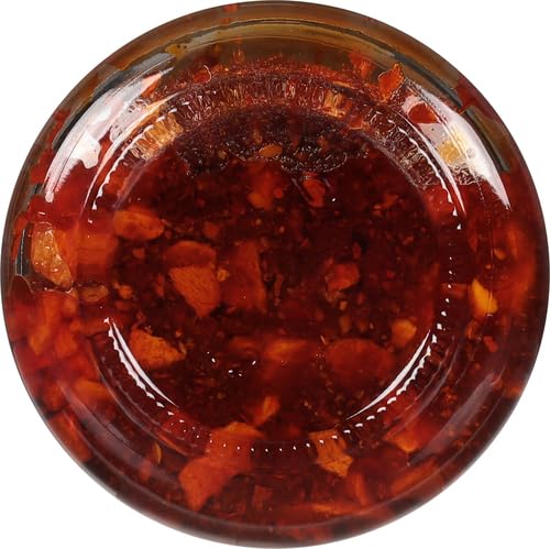 S&B chili oil with tofu stir-fry, boosting umami and texture.