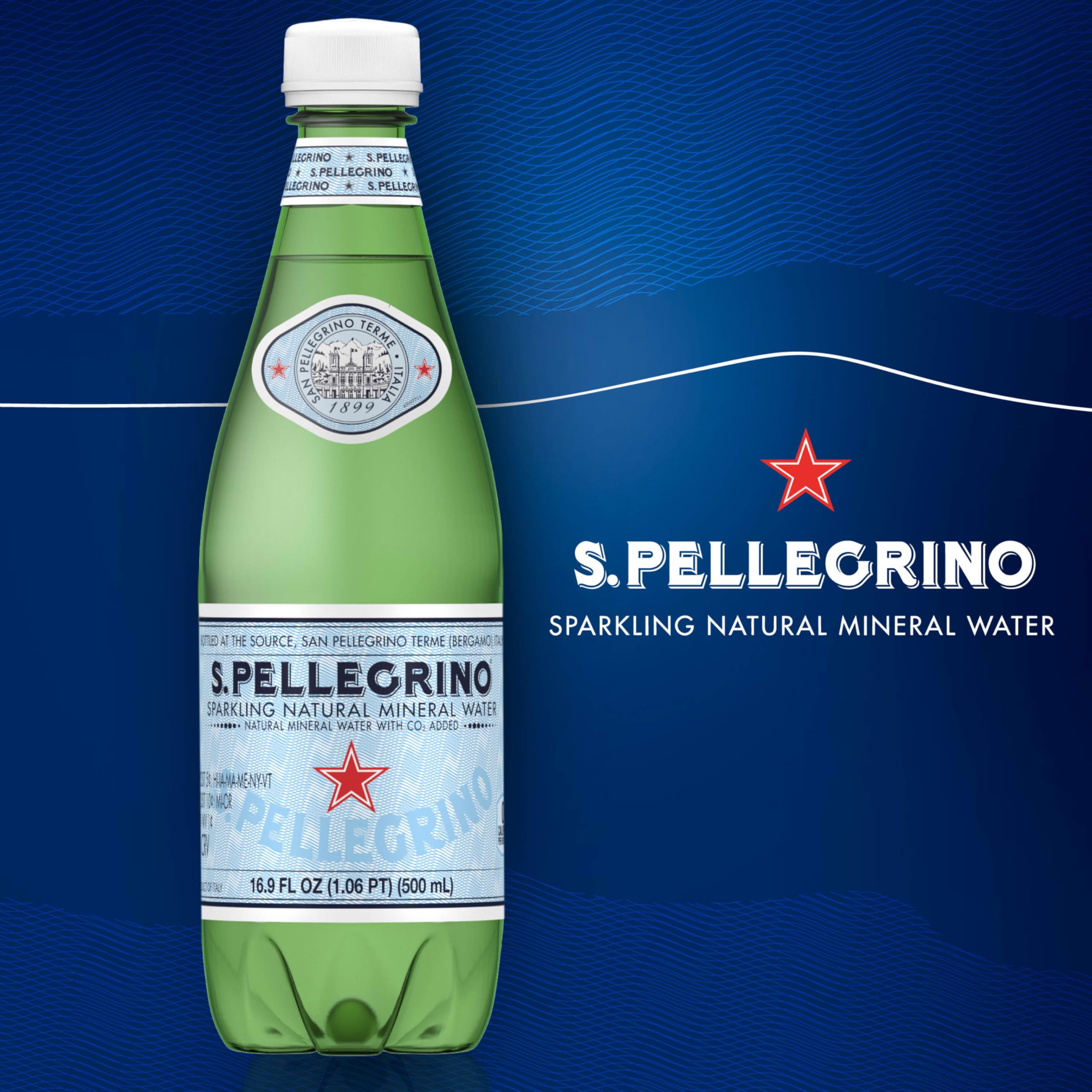 Close-up of S.Pellegrino bubbles in glass showing crisp effervescence.