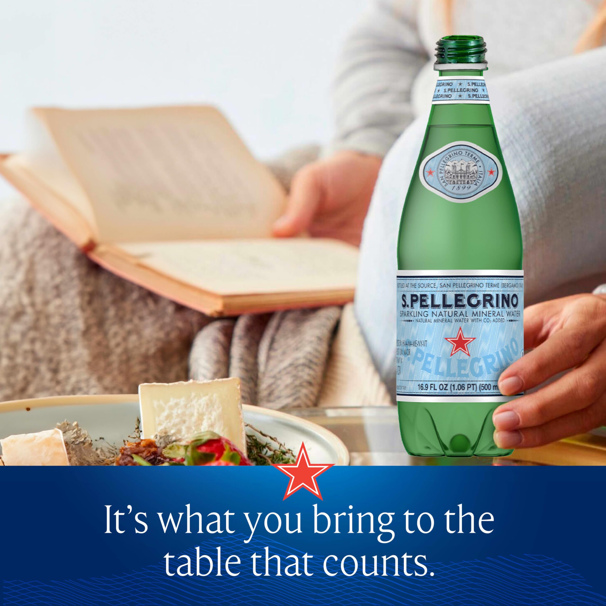 Pouring S.Pellegrino into a glass to enjoy with a meal