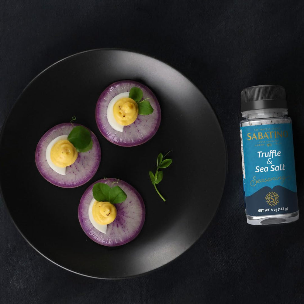 Sabatino Tartufi truffle salt vibrant jar label conveys authenticity and quality.