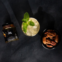 Sabatino Tartufi truffle-infused honey being poured for dessert