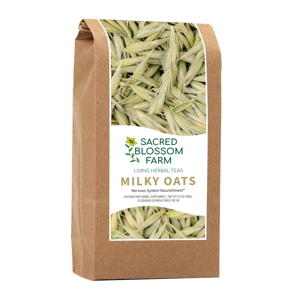 Sacred Blossom Farm Milky Oats bottle pour, ready for a tea ritual.