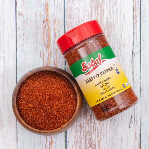 Sadaf Aleppo Pepper sprinkled on a dish to add brightness.