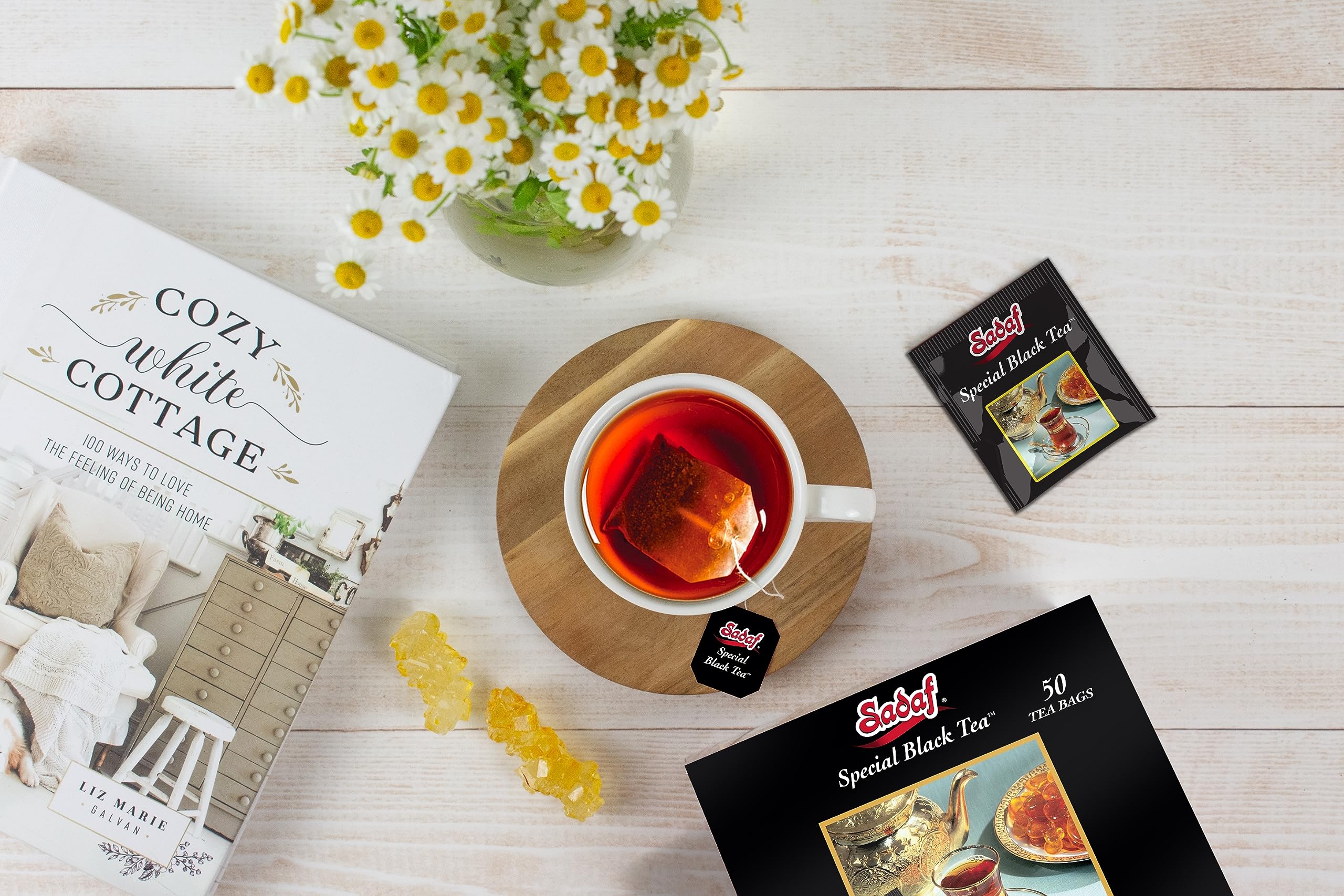 Sadaf Special Black Tea cup ready to enjoy with pastries.
