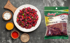Sadaf Sumac seeds close-up highlights vibrant tart spice for rubs.