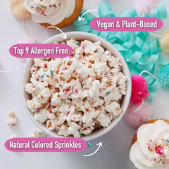 Kettle-popped texture close-up of Safe + Fair Birthday Cake Drizzled Popcorn