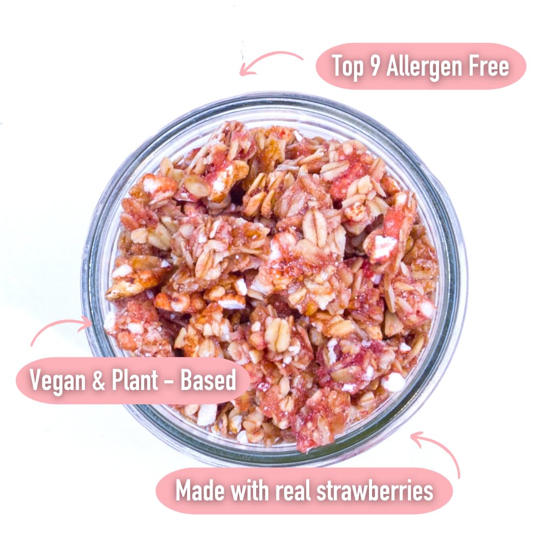 Safe + Fair granola closeup with real strawberries and crunchy texture.