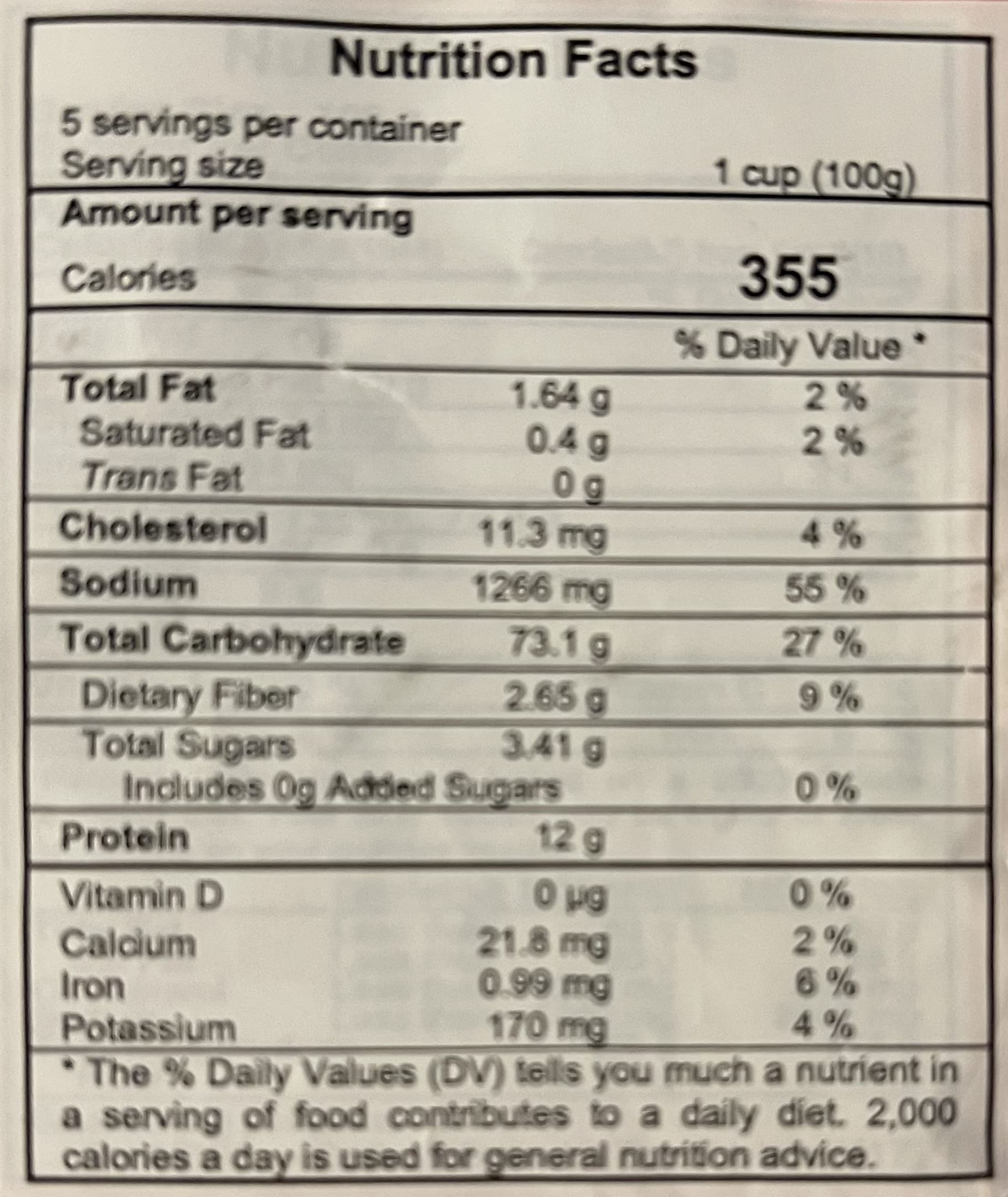 Safoco Egg Noodles 500g cooking in a pot with steam.
