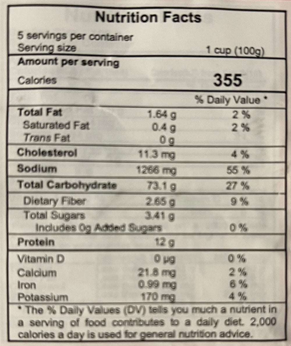Safoco Egg Noodles 500g cooking in a pot with steam.