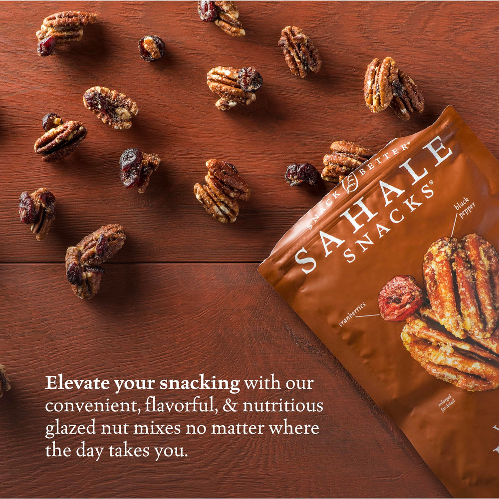 Resealable pouch preserves Sahale mix freshness for on-the-go snacking.