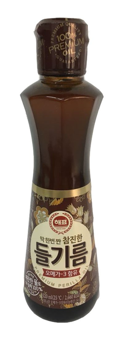 SAJO Perilla Oil bottle 320ml on kitchen counter, ideal for adding subtle nutty flavor.