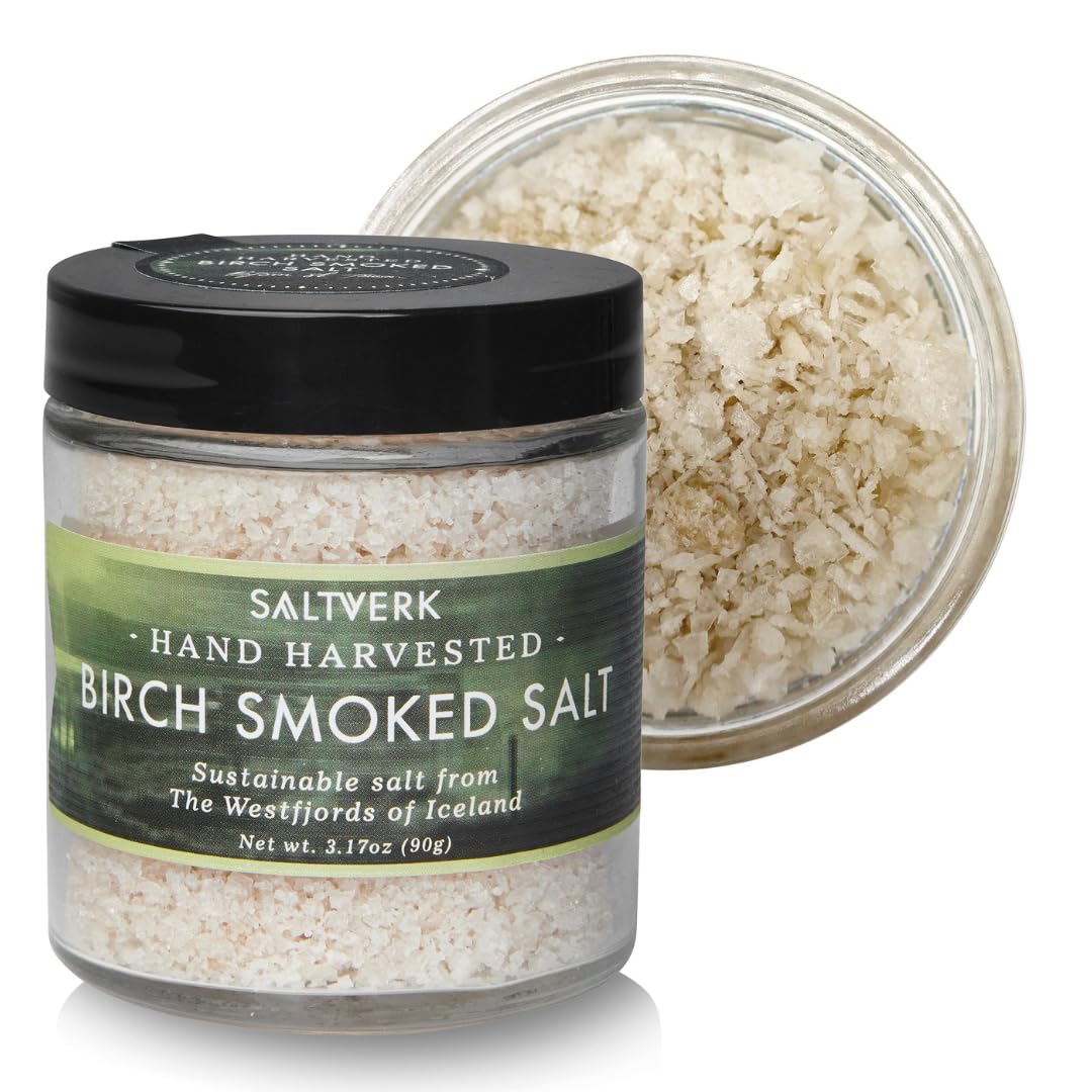 Saltverk birch smoked sea salt bottle on kitchen shelf, premium flavor ready to finish dishes.