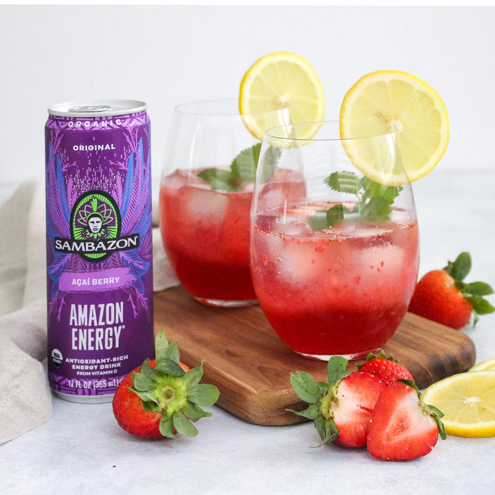 Outdoor adventure scene with Sambazon energy can for pre-hike boost.
