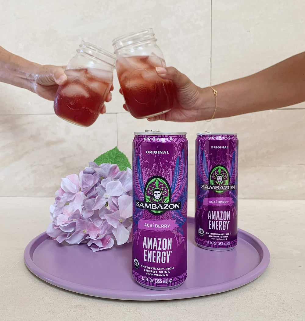 Visual of acai berries beside Sambazon energy can.