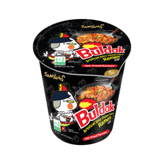SAMYANG Buldak cup noodles label close-up emphasizing heat and convenience.