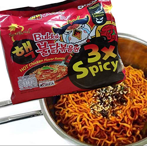 Chili powder and flavor packets with Samyang ramen for depth.