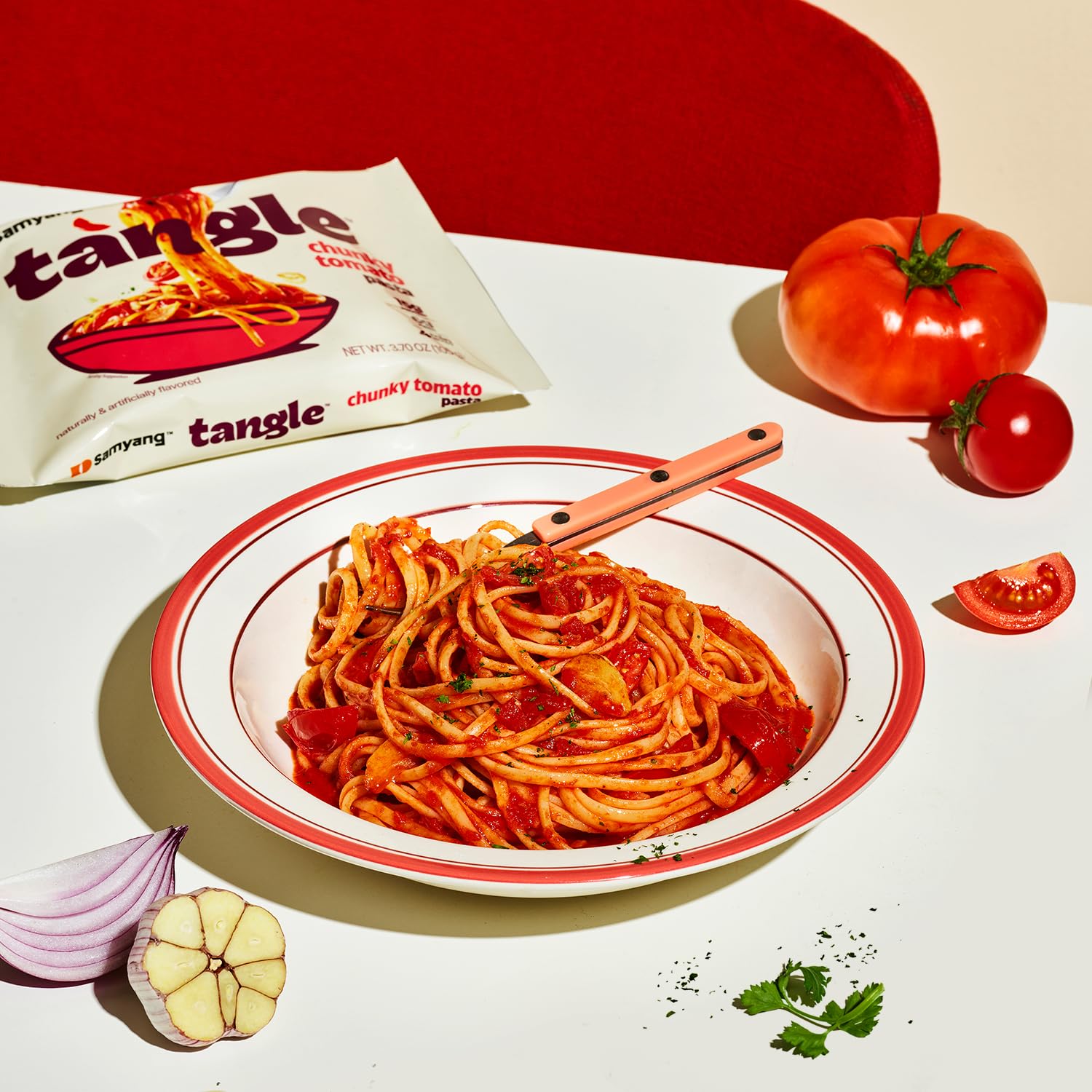 Close-up of SAMYANG linguine texture showing firm bite and sauce adhesion.