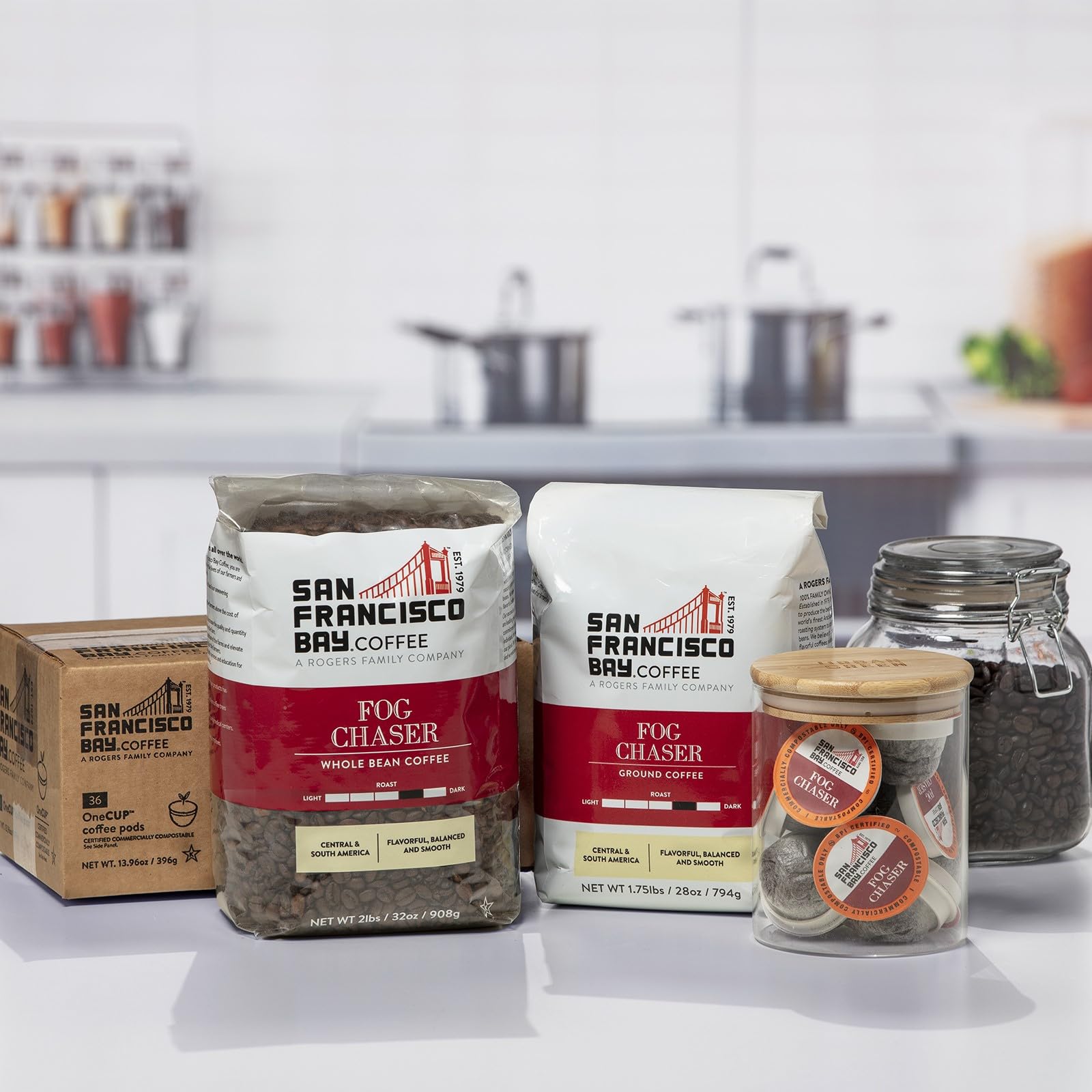 Sustainability label on SF Bay Coffee packaging emphasizes eco-friendly sourcing.