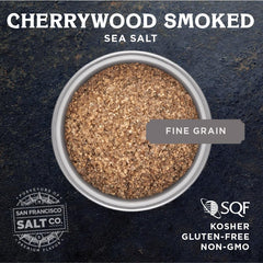 San Francisco Salt Company cherrywood smoked sea salt crystals on a spoon for finishing meats