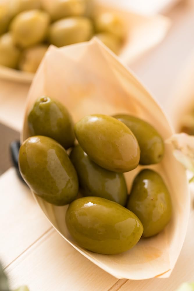 Sanniti Bella di Cerignola olives serving pasta, versatile Italian recipe add-in.