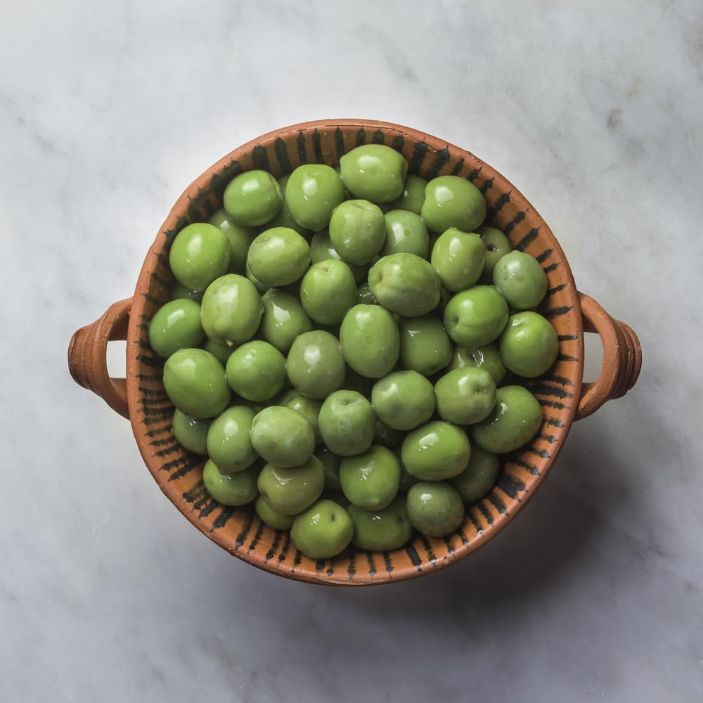 Sanniti olives served with salad for a bright, savory bite.