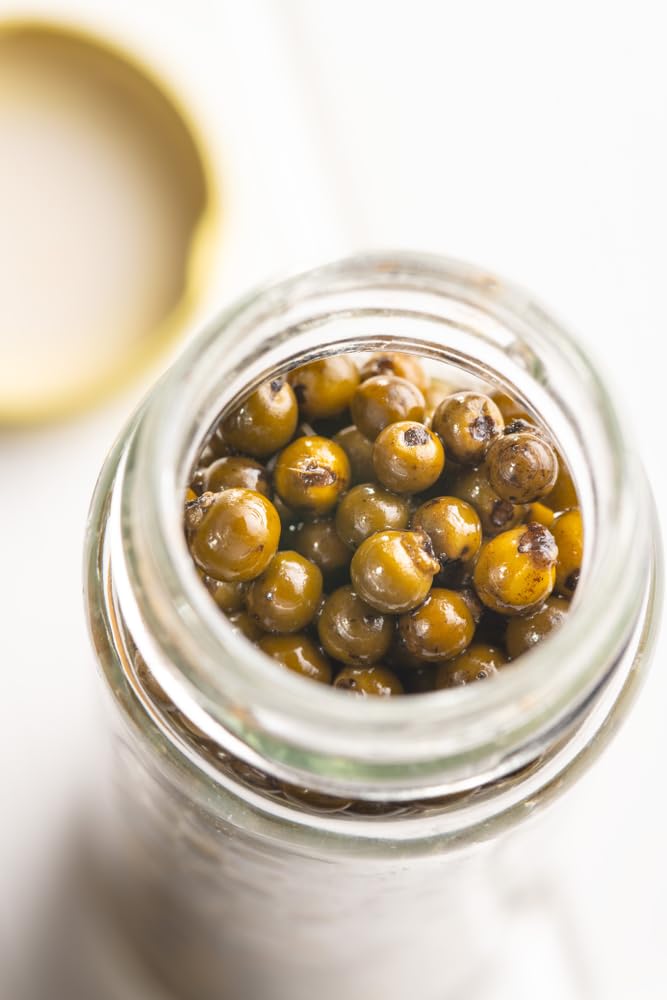 Sanniti Green Peppercorns in Brine closeup, fresh green color and texture