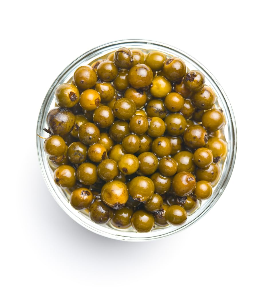 Sanniti Green Peppercorns in Brine on plate, adds gourmet flair