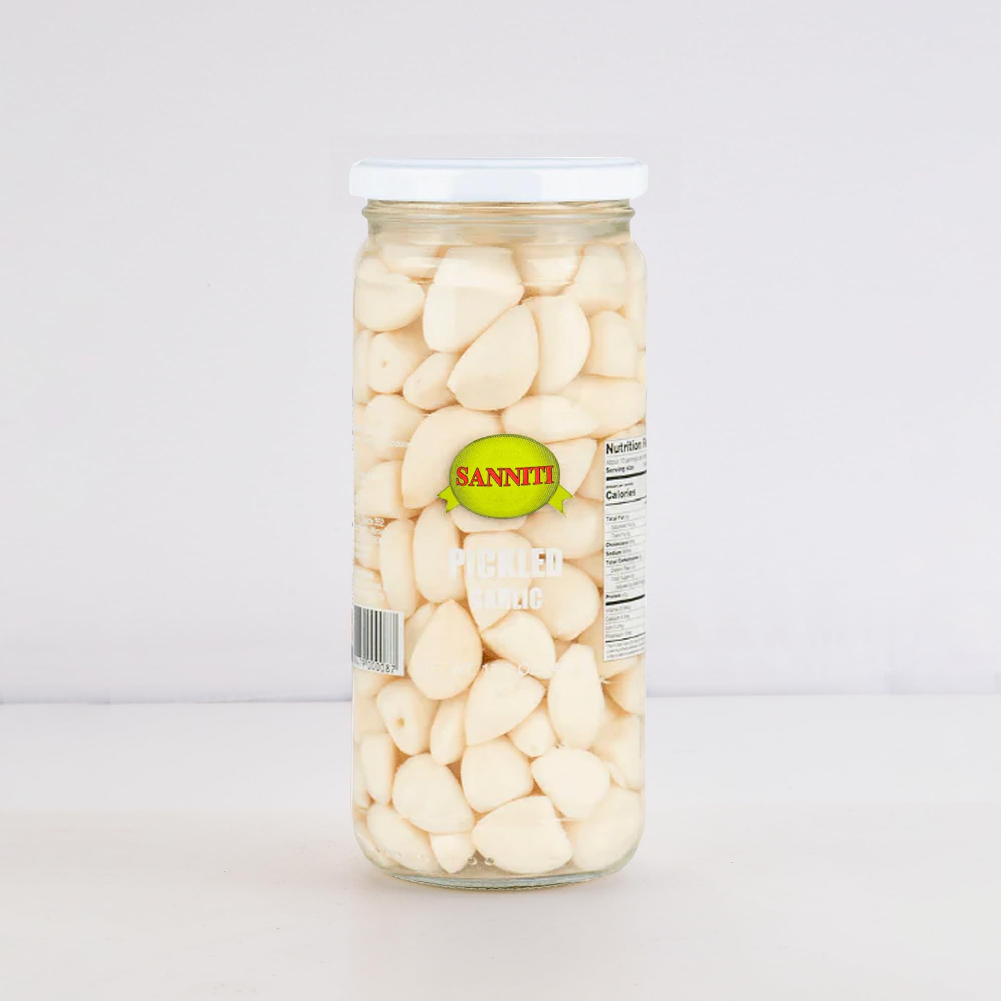 Close-up of Sanniti pickled garlic jar displaying premium pieces.
