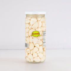 Close-up of Sanniti pickled garlic jar displaying premium pieces.
