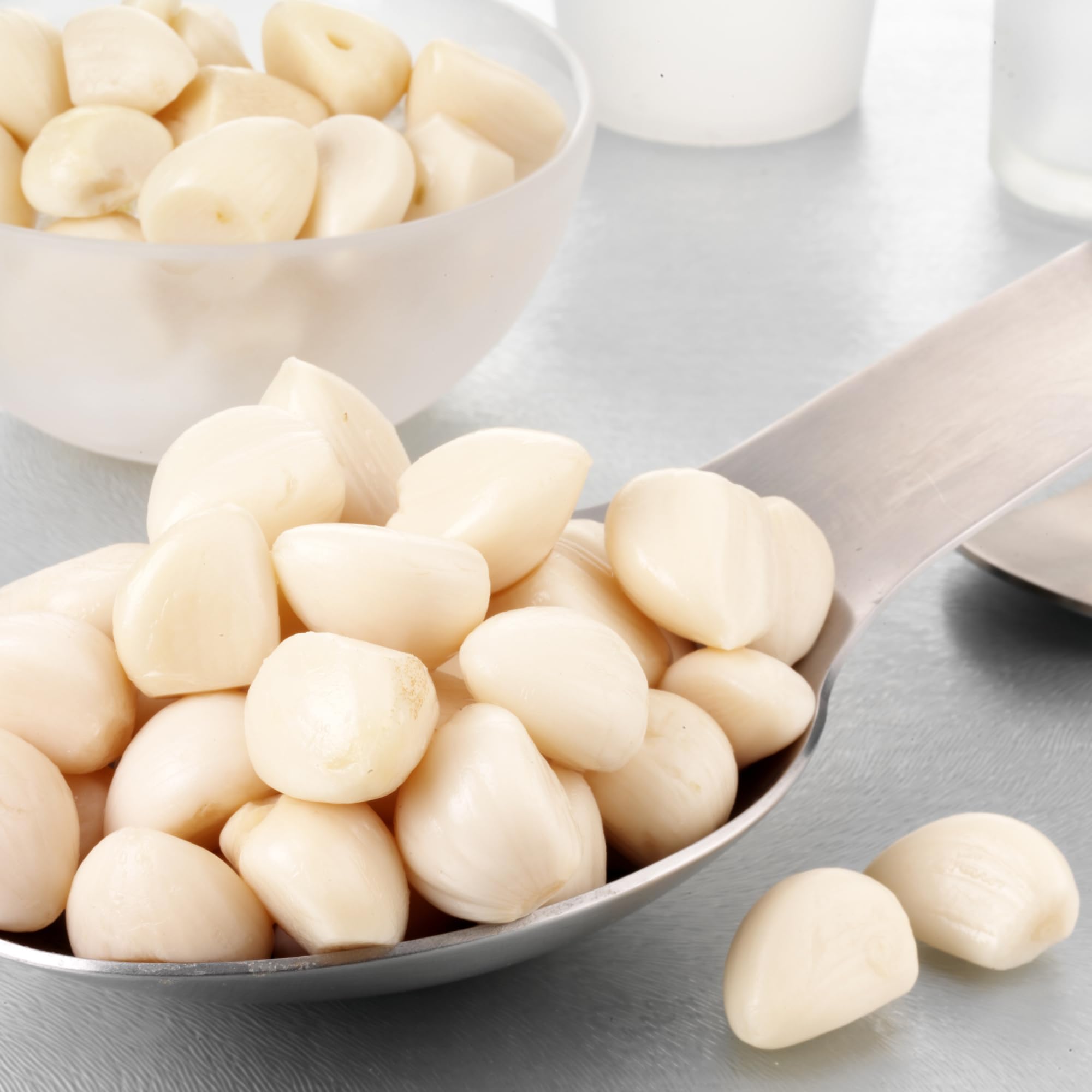 Sanniti pickled garlic with roasted meats enhances savory richness.