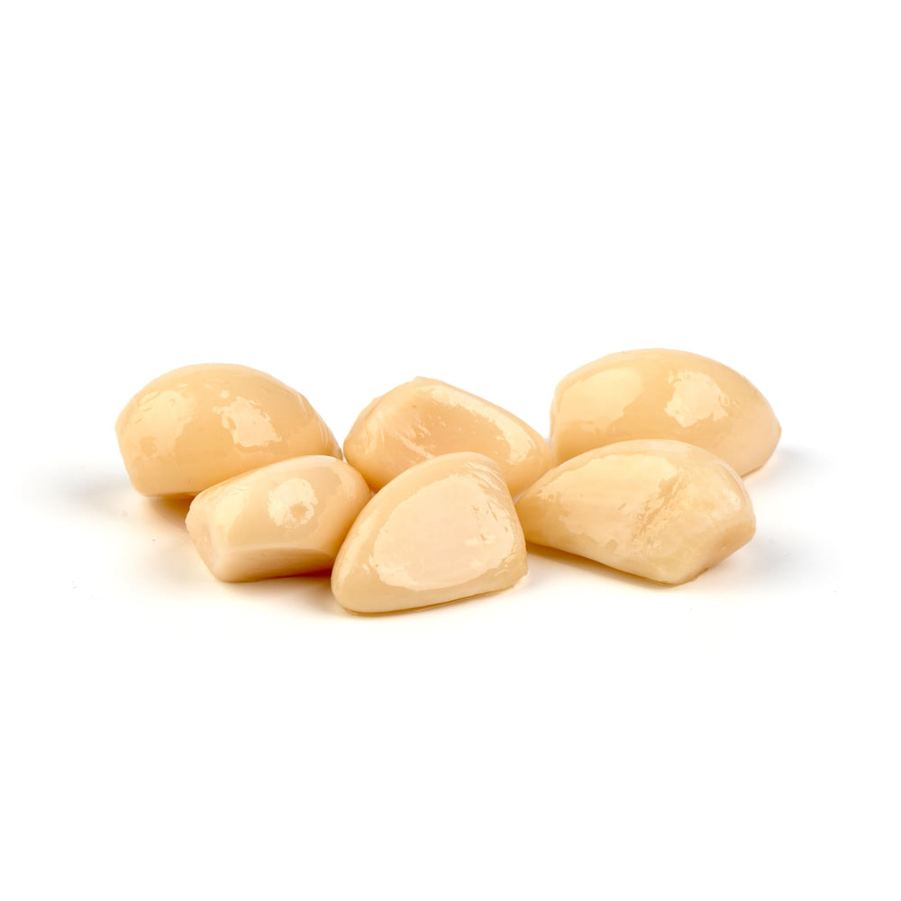 Sanniti pickled garlic serving spoon for easy, measured flavoring.