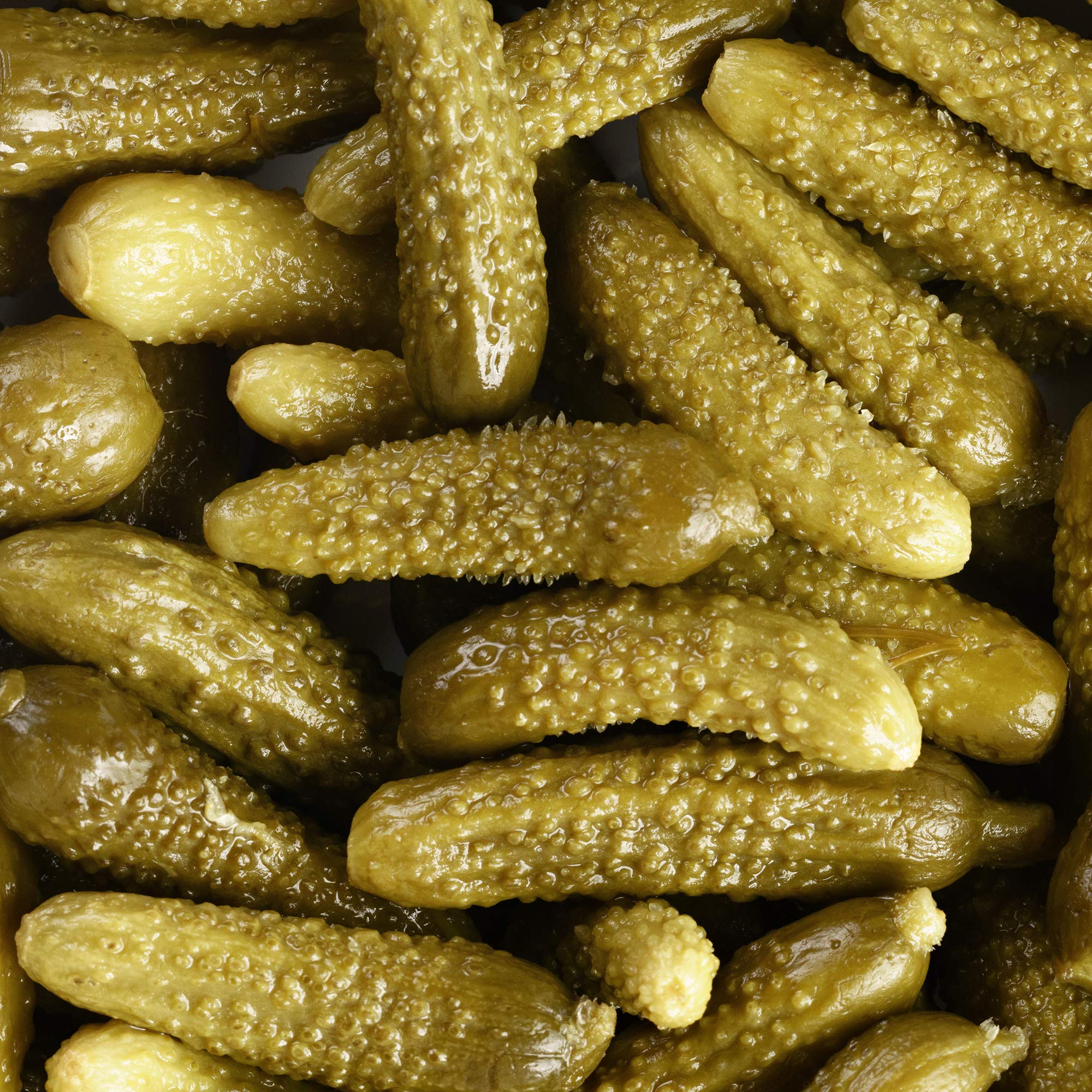 Sanniti Spanish cornichons on a charcuterie board highlighting briny crunch