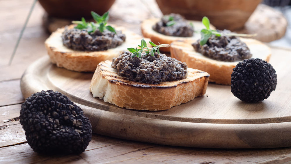 Sanniti Tartufata sauce pour closeup reveals silky, earthy aroma.