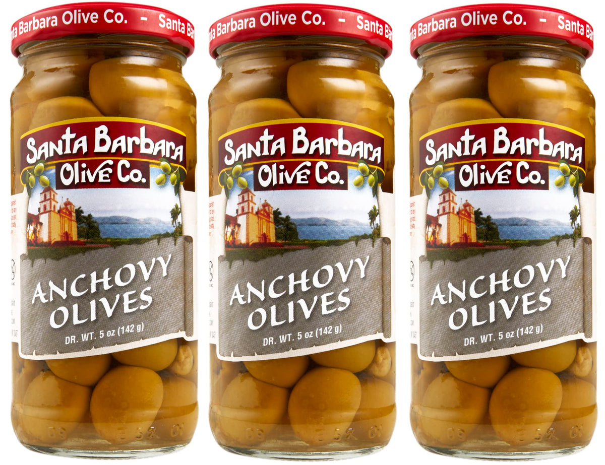 Santa Barbara Olive Co anchovy stuffed green olive 3-pack on a tasting board