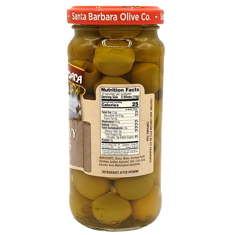 Anchovy stuffed green olive on charcuterie board by Santa Barbara Olive Co