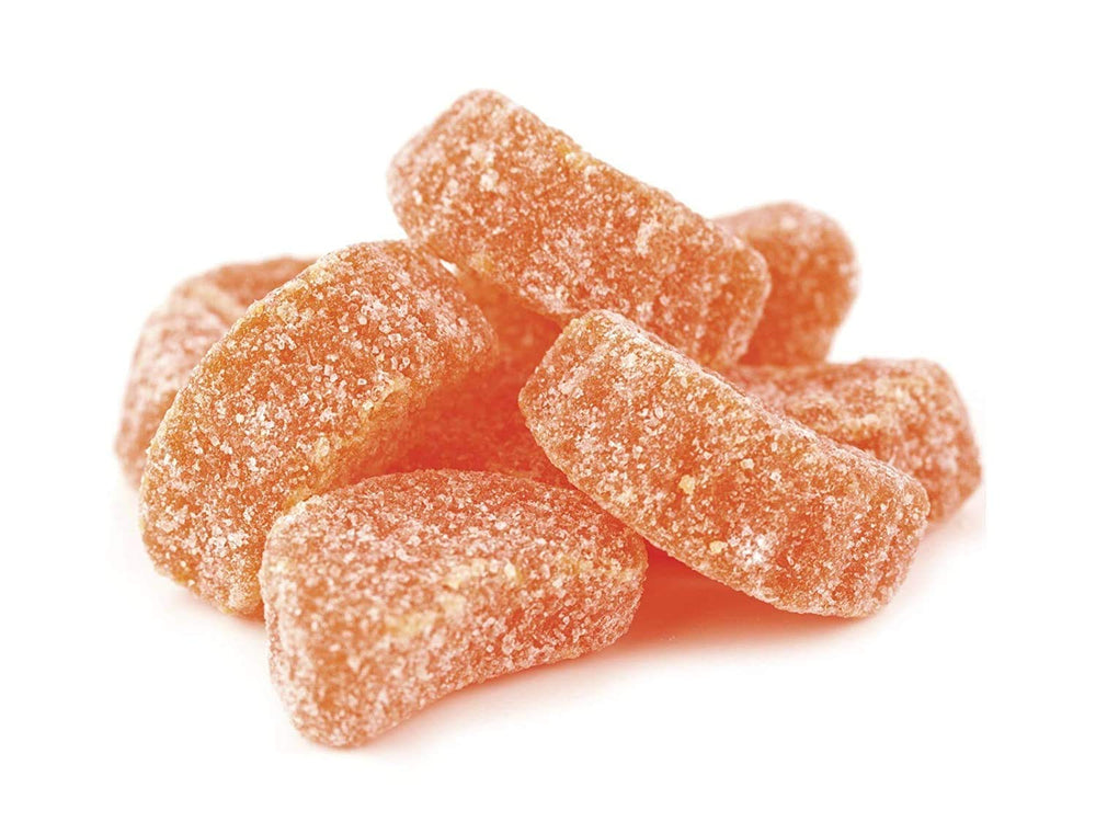 Sarah's Candy Factory bulk orange slices on display, ideal for parties.