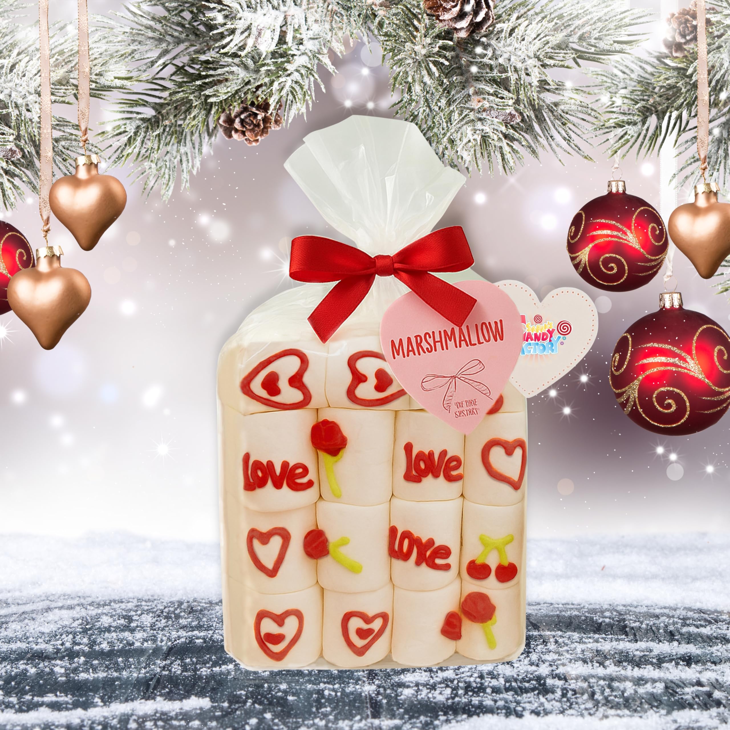 Sarah's Candy Factory gift bag with red ribbon and heart tag.