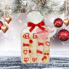Sarah's Candy Factory gift bag with red ribbon and heart tag.