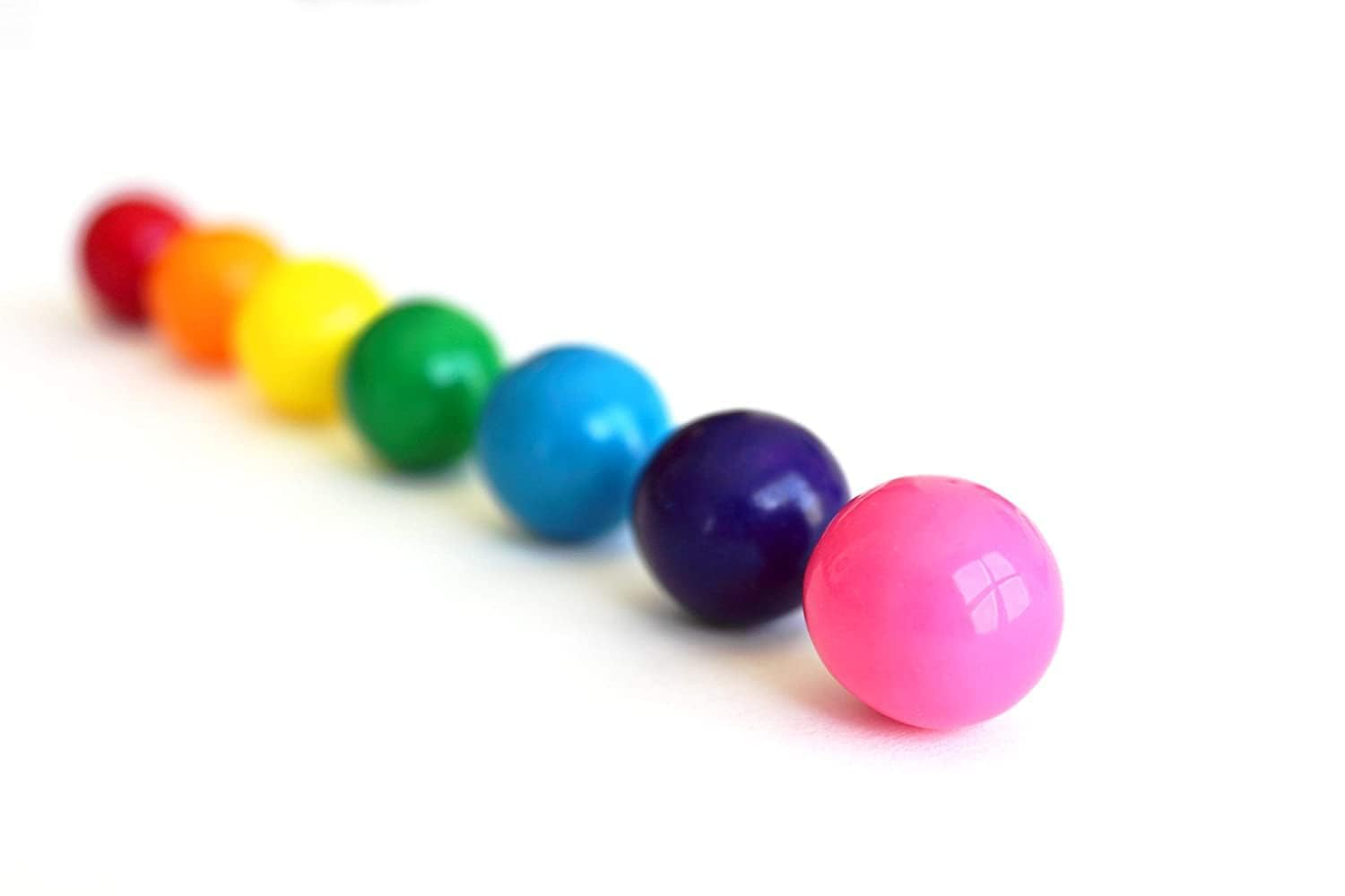 Sarah's Candy Factory gumballs in BPA-free jar for easy storage.