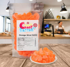 Sarah's Candy Factory resealable bag keeps orange slices gummies fresh between snacking.