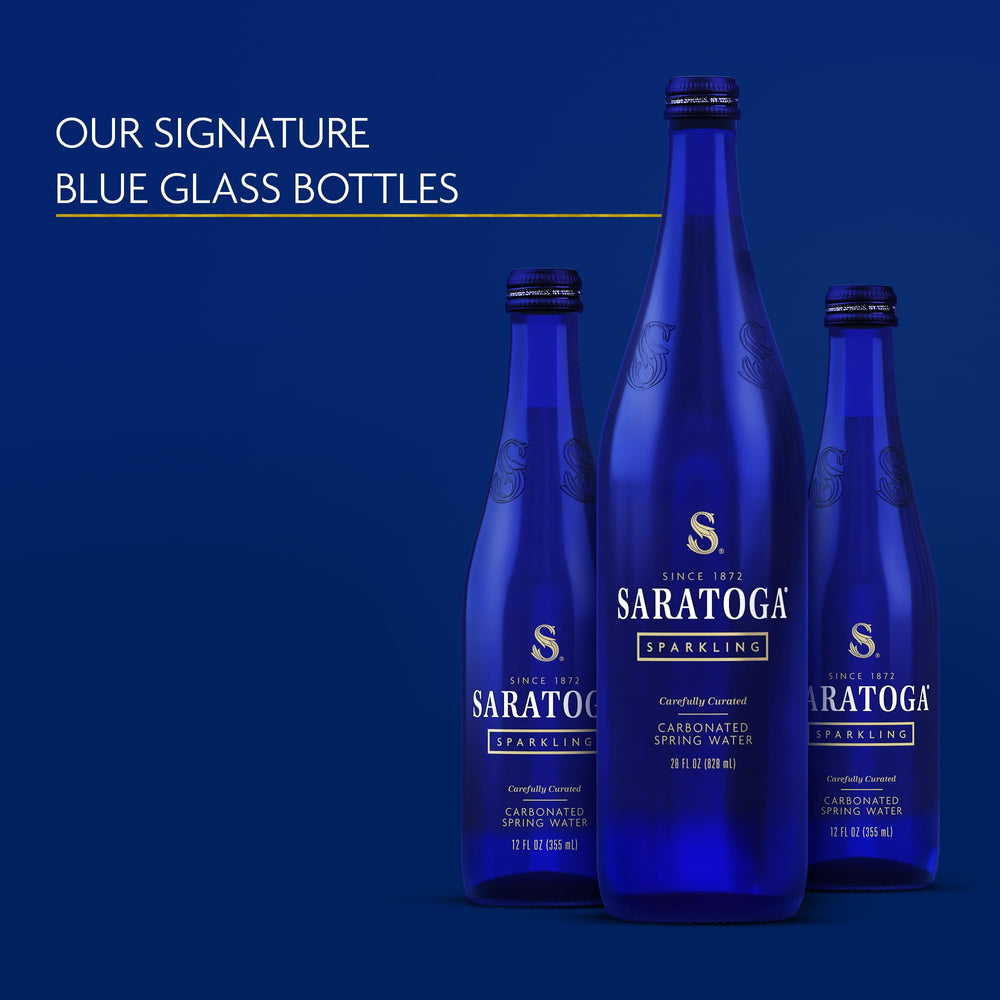 Full Saratoga Sparkling Water bottle ready to pour at the table.