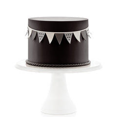 Satin Ice Black Fondant cut-outs form festive shapes with clean edges.