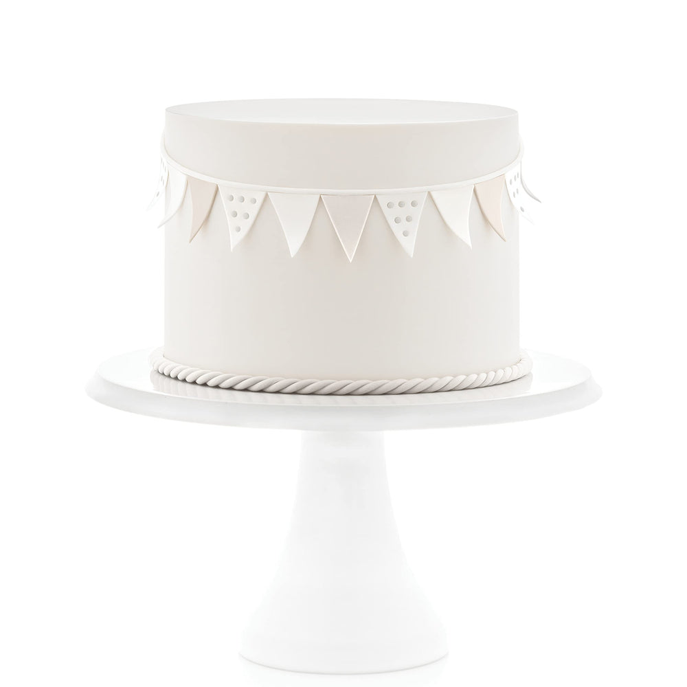 Satin Ice fondant white covers cake with even surface.