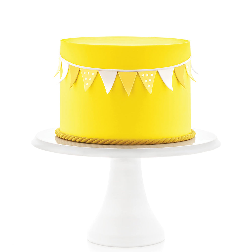 Satin Ice yellow fondant rolled thin for delicate, intricate designs.