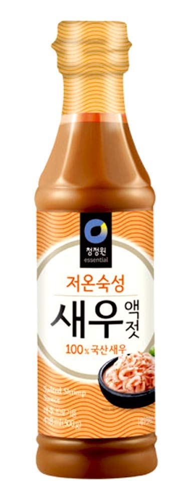 Sattie Korean Fermented Sauce bottle being poured adds depth to savory marinades