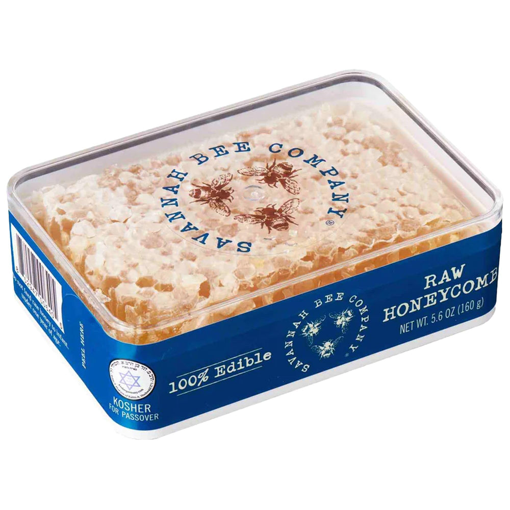 Savannah Bee Pure Raw Acacia Honeycomb slice ready to spread on warm bread