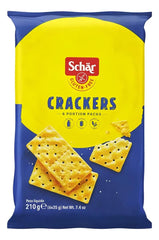 Schär gluten-free crackers on a plate for quick snacking